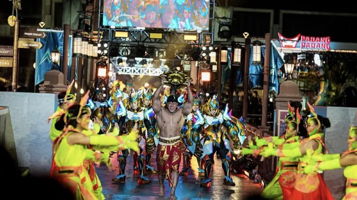 Aktivitas komunitas dalam menebak siapa akan mengangkat trofi